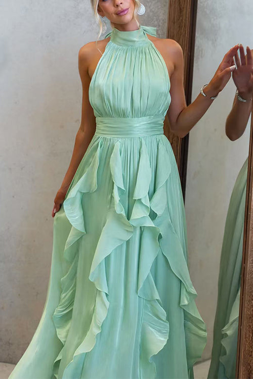 Vestido maxi con escote halter y volantes de caída fluida