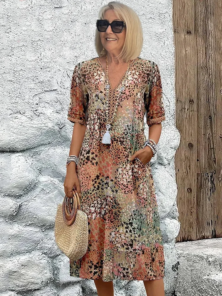 Roxanne™ | Vestido midi envolvente floral vibrante